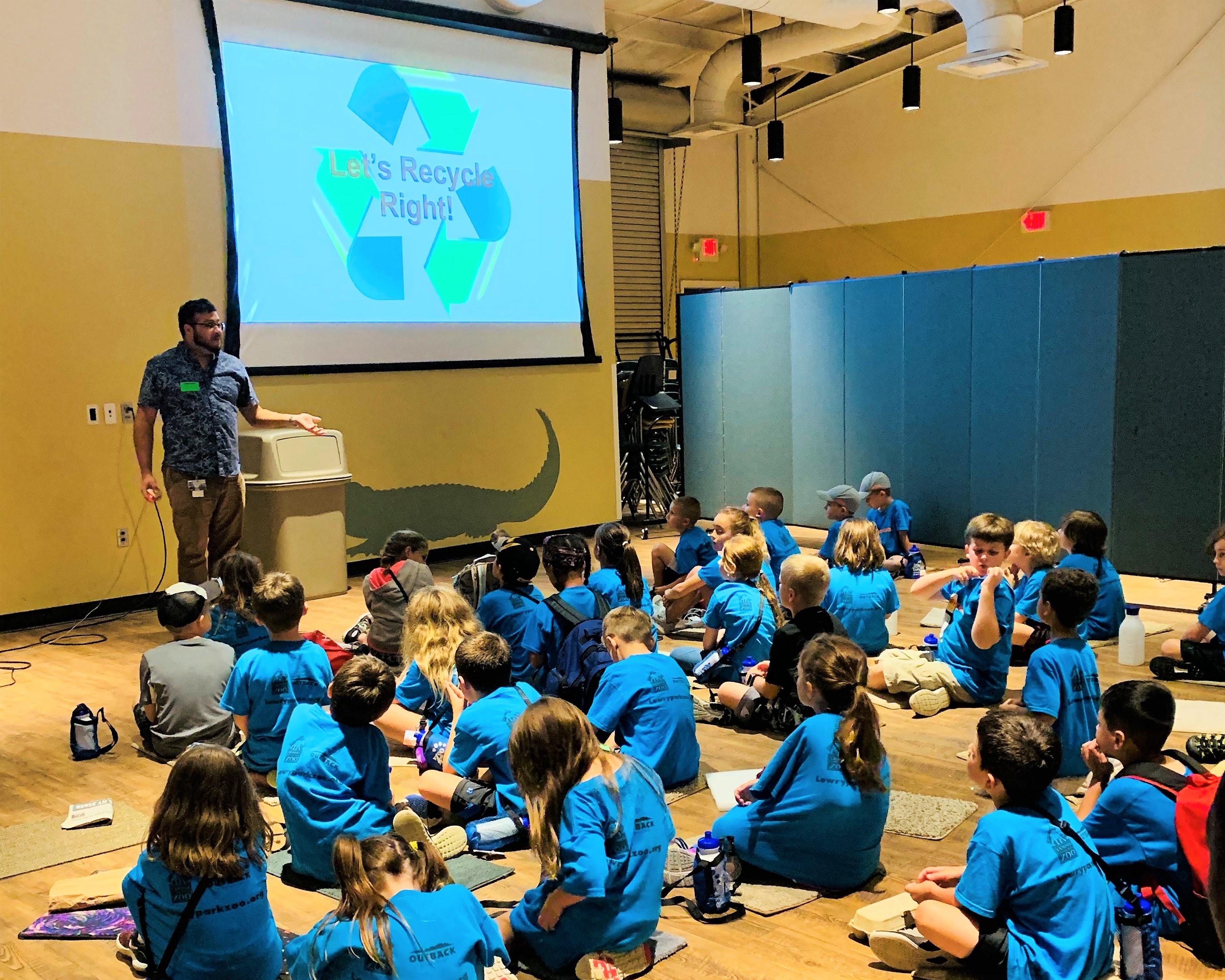 Recycling Specialist at Zoo Tampa presentation with kids